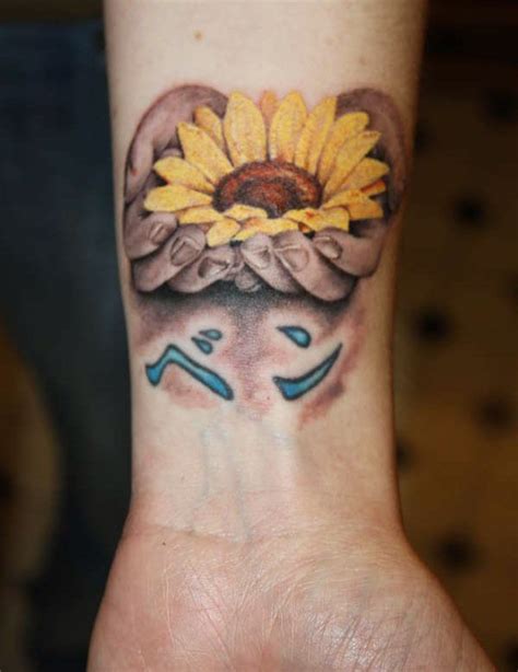 Sunflower In Hand Tattoo Picture Sheplanet Sunflower Tattoo On