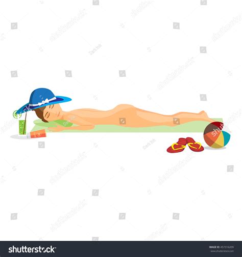 Woman Sunbathes On Beach On Sand Shutterstock