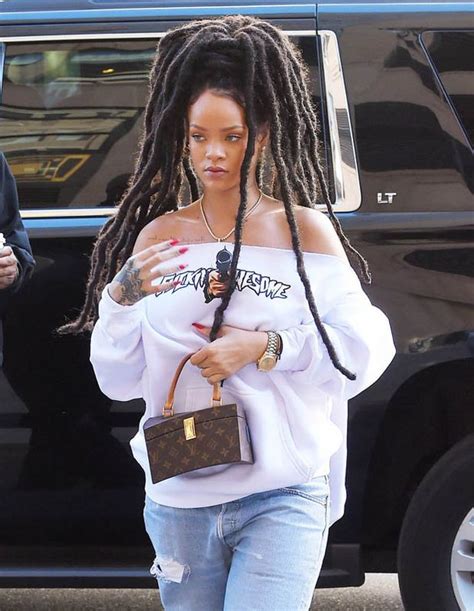 Rihanna Suffers Braless Wardrobe Malfunction As She Bares Mega Sideboob