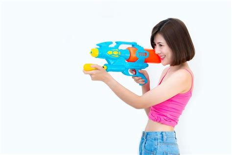 Free Photo Summer Young Beautiful Woman With Water Gun Songkran