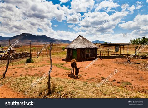 Village In A Valley In Africa With Beautiful Cloudscape Stock Photo