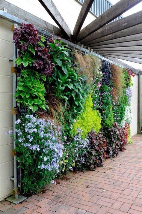 Stunning 56 Tips For Making A House Fence With Stunning Vertical Garden