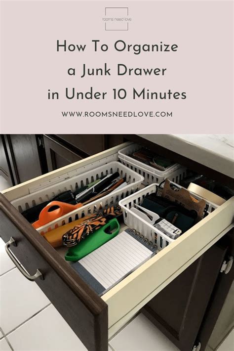 An Open Drawer With Scissors And Other Office Supplies In It That Is
