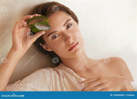 Aloe Vera Woman Holding Slices Of Leaf And Looking At Camera Beauty