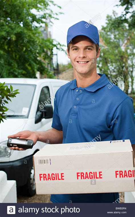 Parcel Delivery Man Stock Photos And Parcel Delivery Man Stock Images Alamy