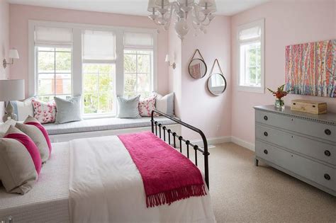 The bedroom is a cozy retreat where we can relax and unwind. Black Metal Bed with Pink and Gray Bedding - Transitional ...