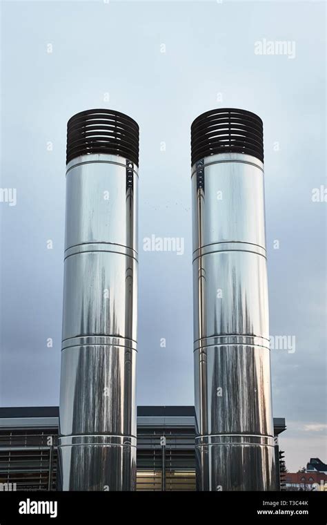 Two Industrial Chimneys Stock Photo Alamy