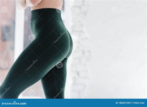 Close Up In Tight Green Leggings Athletic Woman Working Out In A Loft