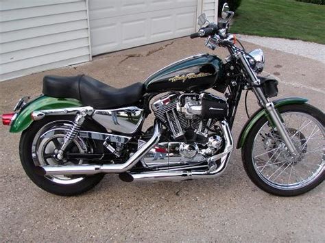 Cast wheels 19 front, 16 rear, twin front discs, flat track handlebars, more sophisticated suspension. 2006 Harley-Davidson® XL1200C Sportster® 1200 Custom ...