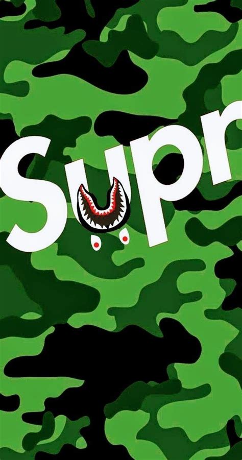 A Green Camo Background With The Word Supr Printed On It And An Image
