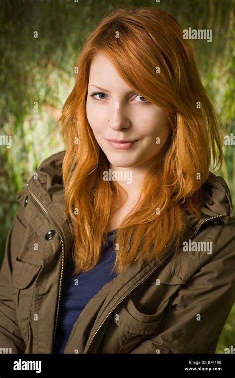 Beautiful Redhead Teen Posing For The Camera With A Cute Smile Stock