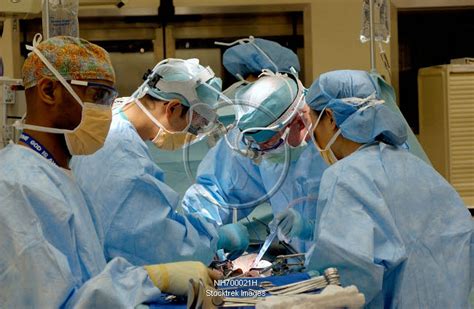 Doctors Performing Surgery Stocktrek Images