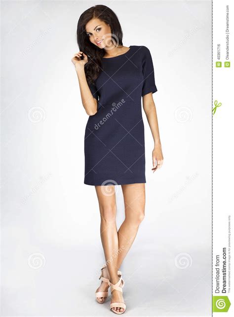 Attractive Brunette Woman Posing In Studio Stock Photo