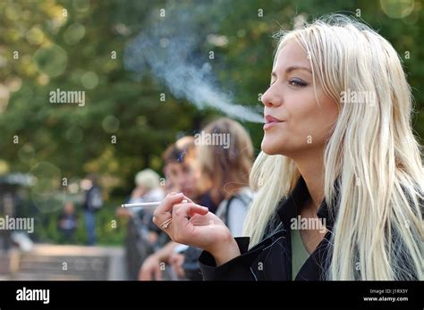 Girl Smoking Outdoors Stock Photo Alamy