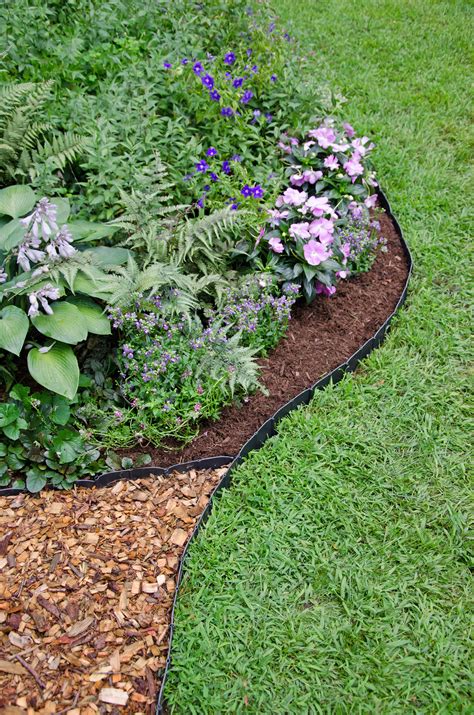 Edging materials you can use are dependent on your choice and what will match your landscape design. Pound-In Landscape Edging | Plastic Lawn Edging ...