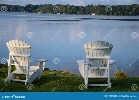 Relaxing By The Lake Stock Photo Image Of Calm Waters 125833934