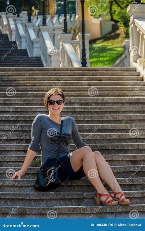 Beautiful Slender Brunette Woman With A Short Hairdo Sunglasses Stock