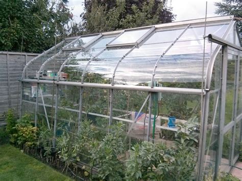 How To Build A Hoop House Style Greenhouse On A Tight Budget · The Wow