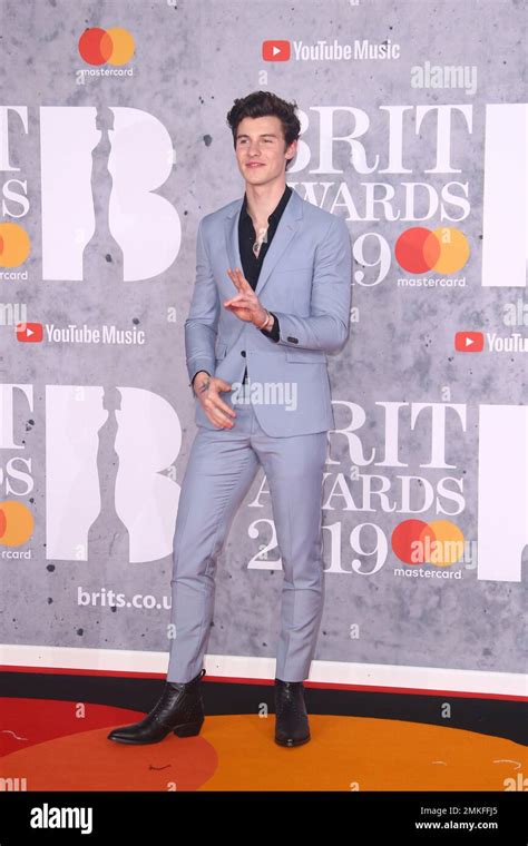Shawn Mendes Poses For Photographers Upon Arrival At The Brit Awards In