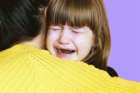 A Loving Sister Hugging A Sad Crying Child A Little Girl Is Crying On