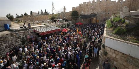 Palm Sunday Sees Thousands Of Christians Mark The Triumphal Entry In