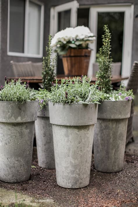 If your balcony leaves you short on space for tall vases and big botanicals, give hanging pots a shot. The Best Tip for Filling Large Outdoor Planters | So Much ...