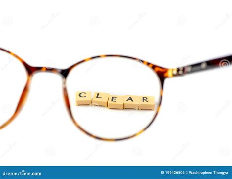 Glasses And A Block Of Letters That Read Clear Clear Vision On