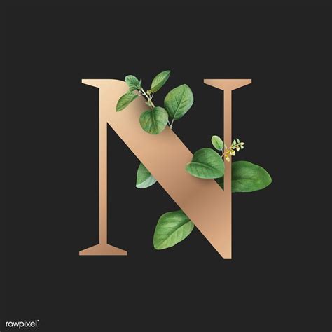 The Letter N Is Made Up Of Green Leaves And Branches On Top Of Each Other
