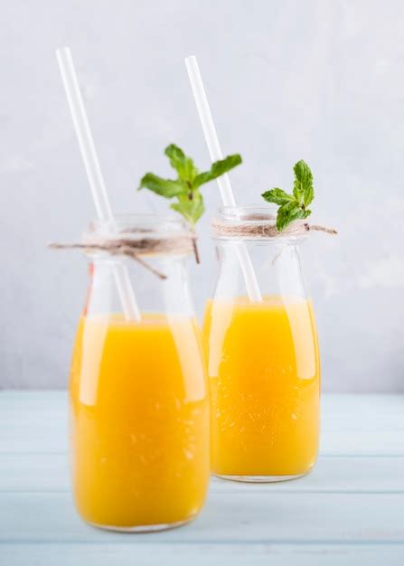 Free Photo Delicious Homemade Orange Juice With Straws