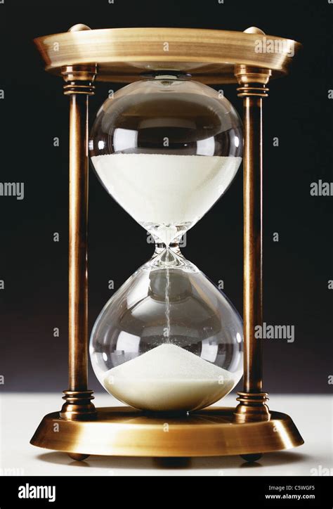 Hourglass On Black Background Close Up Stock Photo Alamy