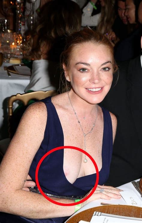 Busty Redhead Lindsay Lohan Accidentally Flashes Her Nipple The