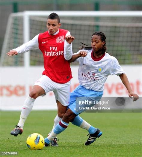 Craig Eastmond Of Arsenal Skips Past Daniel Johnson Of Villa During