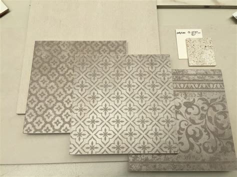 The monochromatic, moroccan floor tile she installed took the newly renovated space to a new chic level. French Meets Moroccan. This week's tile showroom display.