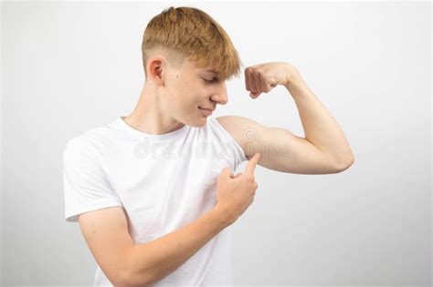Teenage Boy Flexing His Bicep Stock Photo Image Of Teen Biceps