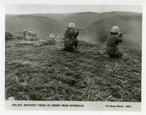 9th Infantry Division Shooting At Enemy Forces On A Hilltop Near