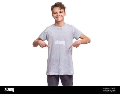 Smiling Teen Boy Isolated On White Background Happy Child Pointing