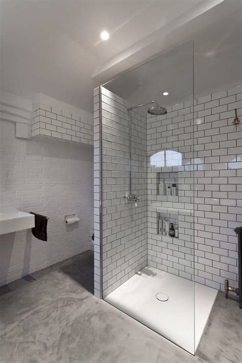 Subway tile is a rectangular tile that typically measures 3 inches by 6 inches, though it can be any rectangular tile with a length twice its height. london subway tile bathroom designs contemporary with en ...