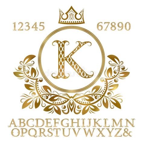 Golden Patterned Letters With Initial Monogram In Coat Of Arms Form