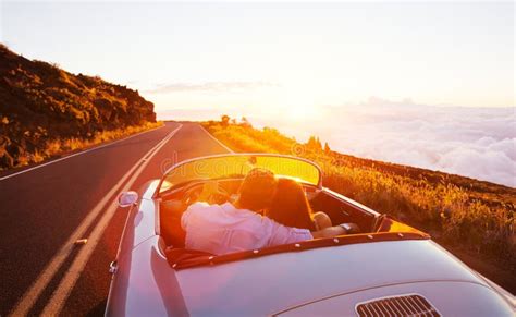 Romantic Couple Driving On Beautiful Road At Sunset Stock Image Image