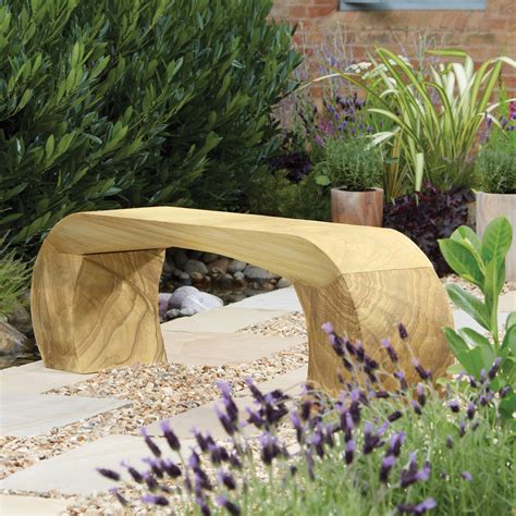 An outdoor bench makes a great complement to garden chairs. Teakwood natural sandstone bench €284 B&Q | Outdoor garden ...