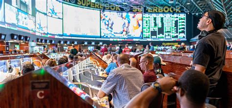 Chairs were formerly placed touching/right against each other. The World's Largest Las Vegas Sports Book | Westgate Las ...