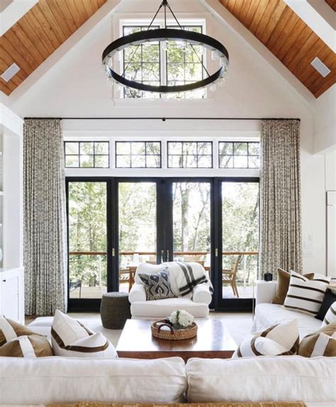 Beautiful Vaulted Wood Ceiling Large Round Chandelier Big Windows For