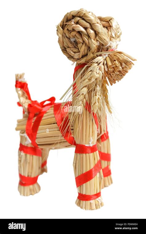 Traditional Swedish Christmas Goat Made Out Of Straw Isolated On White