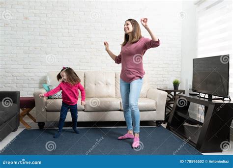 Mother And Daughter Dancing At Home Stock Photo Image Of Mother