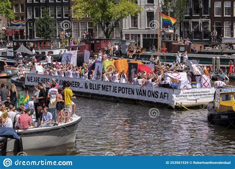 3 layers boat at the gaypride canal parade with boats at amsterdam the netherlands 6 8 2022