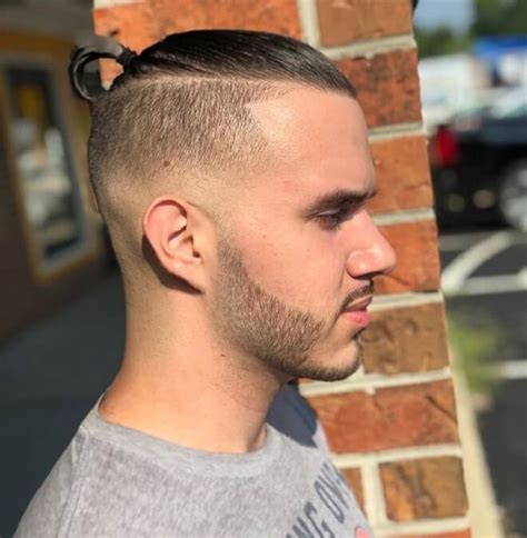 A man bun fade is a men's hairstyle that blends two hairstyles together. 25 Attractive Man Bun Fade Styles | Best Man Bun ...