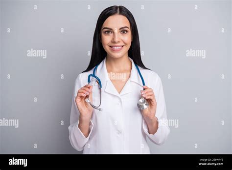 Photo Of Cheerful Doctor Girl Hold Equipment Toothy Smile Wear