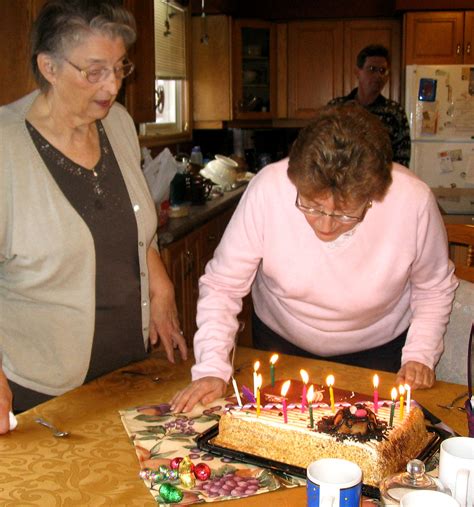 auntie barb s cake auntie barb blows out the candles of he… flickr