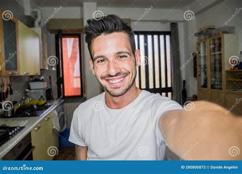 Photo Of Handsome Man Taking A Selfie At Home Smiling On The Camera Stock Image Image Of