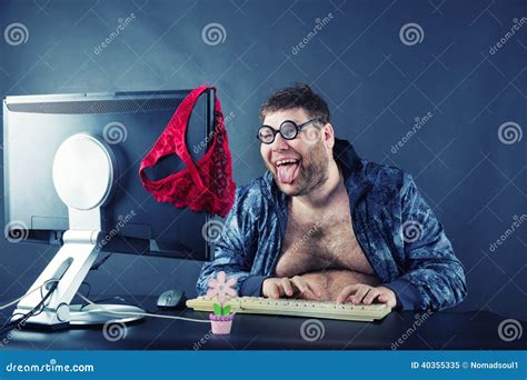 Man Sitting At Desk Looking On Computer Screen Stock Image Image Of